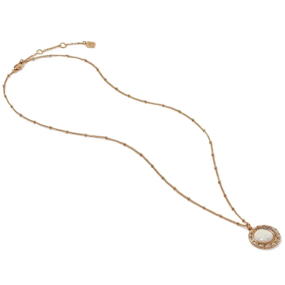 celestial_symbols_carved_motherofpearl_pendant_necklace_3.webp Celestial Symbols Carved Mother-of-Pearl Pendant Necklace*The Met Store Online