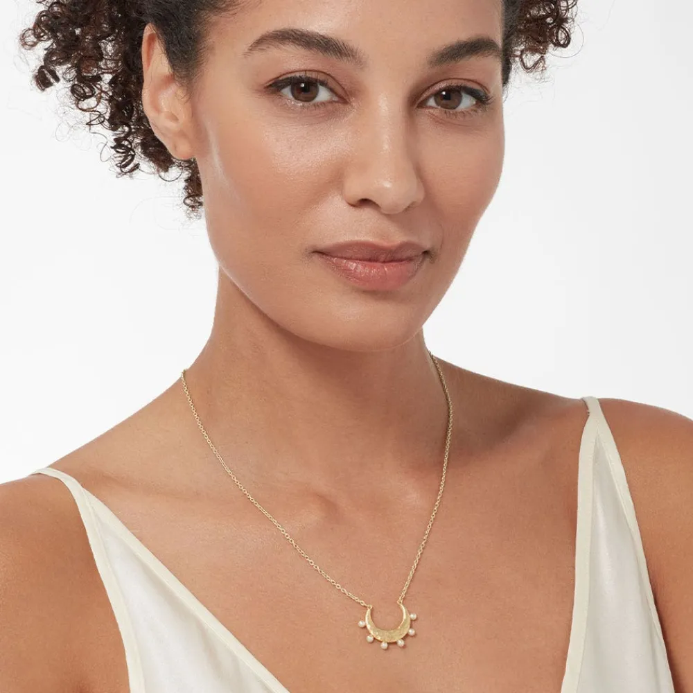 hammered_crescent_pearl_pendant_necklace_1.webp Hammered Crescent Pearl Pendant Necklace*The Met Store Store